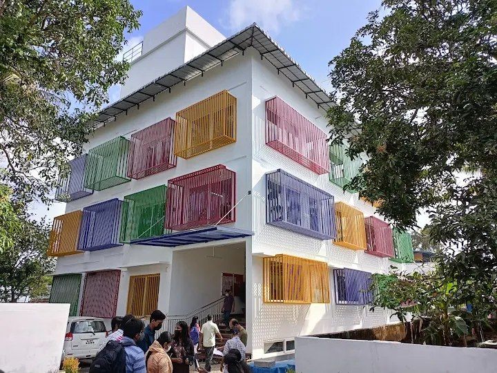The RIITS campus building with colourful window grills